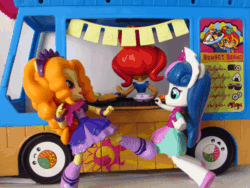 Size: 600x450 | Tagged: safe, artist:whatthehell!?, adagio dazzle, bon bon, sunset shimmer, sweetie drops, equestria girls, rainbow rocks, action pose, animated, doll, equestria girls minis, fight, food, irl, parody, photo, sunset sushi, sushi, toy, truck