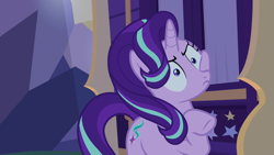 Size: 1280x720 | Tagged: safe, screencap, starlight glimmer, pony, unicorn, to where and back again, female, mare, raised hoof, solo, trixie's wagon