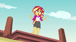 Size: 1280x720 | Tagged: safe, screencap, sunset shimmer, equestria girls, legend of everfree, camp everfree outfits, clothes, embrace the magic, female, open mouth, pier, shorts, singing, solo