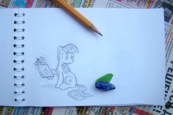 Size: 800x533 | Tagged: safe, artist:onkelscrut, derpibooru import, honeysuckle, twilight sparkle, book, fourth wall, pencil, pencil drawing, photo, reading, sketch, solo, traditional art