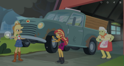 Size: 1366x725 | Tagged: safe, screencap, applejack, granny smith, sunset shimmer, driving miss shimmer, driving miss shimmer: applejack, equestria girls, equestria girls series, apple-jack, clothes, super strength, truck