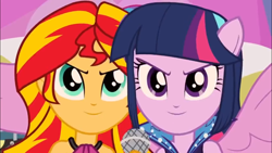 Size: 1366x768 | Tagged: safe, screencap, sunset shimmer, twilight sparkle, equestria girls, rainbow rocks, >:), happy, microphone, ponied up, rebecca shoichet, smiling, smirk, voice actor joke, welcome to the show