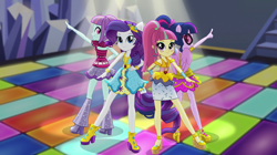 Size: 1912x1072 | Tagged: safe, screencap, rarity, sci-twi, sour sweet, sunny flare, twilight sparkle, dance magic, equestria girls, spoiler:eqg specials, boots, clothes, female, freckles, glasses, group, high heel boots, high heels, legs, ponied up, ponytail, shoes, skirt