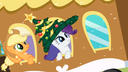 Size: 960x540 | Tagged: safe, screencap, applejack, rarity, earth pony, pony, unicorn, hearth's warming eve (episode), christmas tree, giant hat, hat, hearth's warming eve