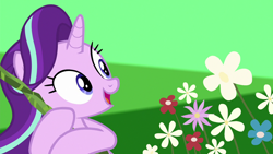 Size: 1280x720 | Tagged: safe, screencap, starlight glimmer, pony, unicorn, road to friendship, female, flower, mare, open mouth, solo, spring, we're friendship bound