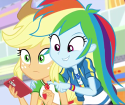 Size: 765x642 | Tagged: safe, derpibooru import, screencap, applejack, rainbow dash, better together, equestria girls, rollercoaster of friendship, cellphone, cropped, geode of super speed, geode of super strength, lip bite, magical geodes, phone, pointing, smartphone