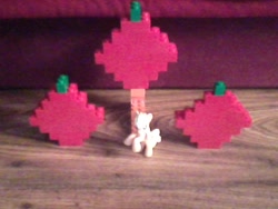 Size: 640x480 | Tagged: safe, artist:pinkameena, applejack, blind bag, cutie mark, irl, lego, photo, toy