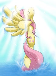 Size: 1237x1681 | Tagged: safe, artist:michinix, fluttershy, pegasus, pony, butt, crepuscular rays, eyes closed, female, mare, open mouth, plot, smiling, solo, sparkles, splash, spread hooves, spread wings, water, wet mane, wings