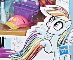 Size: 1029x845 | Tagged: safe, artist:ritalux, derpibooru import, rainbow dash, pegasus, pony, equestria girls, doll, equestria girls minis, hasbro logo, official, official art, open mouth, solo, toy, wings