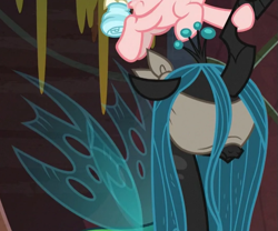 Size: 533x443 | Tagged: safe, screencap, cozy glow, queen chrysalis, changeling, changeling queen, pegasus, pony, frenemies (episode), blindfold, cropped, female, filly, solo focus