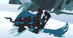 Size: 902x476 | Tagged: safe, screencap, queen chrysalis, changeling, changeling queen, frenemies (episode), female, on back, snow, solo