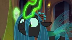 Size: 1920x1080 | Tagged: safe, screencap, queen chrysalis, changeling, changeling queen, frenemies (episode), confused, crown, evil lair, female, fire, former queen chrysalis, frown, glowing horn, grogar's lair, horn, jewelry, lair, log, looking down, regalia, slit eyes, solo, torch, wide eyes
