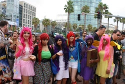 Size: 960x640 | Tagged: artist needed, safe, derpibooru import, fluttershy, pinkie pie, rainbow dash, rarity, twilight sparkle, human, 2012, book, clothes, convention, cosplay, elements of harmony, feather boa, irl, irl human, photo, san diego comic con, sweater, sweatershy, tutu