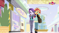 Size: 1600x900 | Tagged: safe, screencap, starlight glimmer, sunset shimmer, equestria girls, mirror magic, spoiler:eqg specials, bag, beanie, bedroom eyes, boots, clothes, duo, female, food, geode of empathy, hat, ice cream, jacket, leather jacket, lidded eyes, magical geodes, ripped pants, shoes, skirt, vest, walking