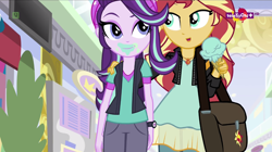 Size: 1366x767 | Tagged: safe, screencap, starlight glimmer, sunset shimmer, equestria girls, mirror magic, spoiler:eqg specials, bag, beanie, clothes, eating, face, food, geode of empathy, hat, hug, ice cream, ice cream cone, magical geodes, messy eating, teletoon, thick, wat, wide hips