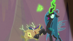 Size: 1920x1080 | Tagged: safe, screencap, queen chrysalis, twilight sparkle, changeling, changeling queen, frenemies (episode), better way to be bad, crown, doll, female, glowing horn, horn, jewelry, magic, regalia, telekinesis, toy