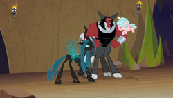 Size: 1280x720 | Tagged: safe, screencap, cozy glow, lord tirek, queen chrysalis, centaur, changeling, changeling queen, pegasus, pony, frenemies (episode), bickering, bow, cloven hooves, evil lair, female, filly, floppy ears, flying, foal, former queen chrysalis, grogar's lair, hair bow, horns, insect wings, lair, male, nose piercing, nose ring, piercing, raised hoof, spread wings, trio, wings