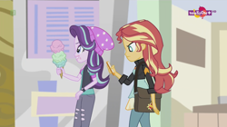 Size: 1136x638 | Tagged: safe, screencap, starlight glimmer, sunset shimmer, equestria girls, mirror magic, spoiler:eqg specials, beanie, canterlot mall, cellphone, female, food, geode of empathy, hat, ice cream, magical geodes, phone, teletoon