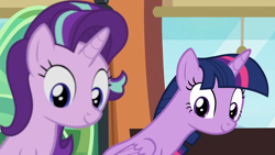 Size: 1920x1080 | Tagged: safe, screencap, starlight glimmer, twilight sparkle, twilight sparkle (alicorn), alicorn, pony, unicorn, the times they are a changeling, cute, duo, duo female, female, glimmerbetes, leaning, looking down, out of focus, seat, smiling, train, twiabetes, window