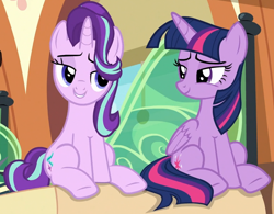 Size: 880x686 | Tagged: safe, screencap, starlight glimmer, twilight sparkle, twilight sparkle (alicorn), alicorn, pony, unicorn, the times they are a changeling, cropped, lidded eyes, looking at each other, sitting, smiling, smug, smuglight glimmer, smuglight sparkle, train