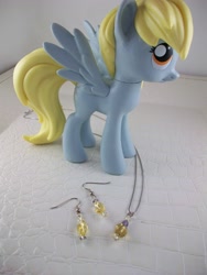 Size: 2748x3664 | Tagged: source needed, safe, derpy hooves, pegasus, pony, earring, female, funko, irl, jewelry, mare, photo, toy