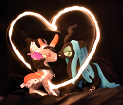 Size: 2000x1710 | Tagged: safe, artist:earthenhoof, king sombra, queen chrysalis, alicorn, changeling, changeling queen, unicorn, chrysombra, couple, female, fire, heart, irl, long exposure, love, male, photo, plushie, shipping, straight