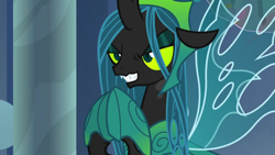 Size: 1280x720 | Tagged: safe, screencap, queen chrysalis, changeling, changeling queen, the ending of the end, armor, crown, evil, evil grin, eyeshadow, female, former queen chrysalis, grin, hoof shoes, hooves together, jewelry, makeup, narrowed eyes, regalia, slit eyes, smiling, solo, spread wings, ultimate chrysalis, wings