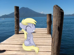 Size: 2304x1728 | Tagged: safe, artist:anevilzebra, artist:missbeigepony, derpy hooves, boat, cloud, cute, eyes closed, filly, grin, irl, mountain, ocean, photo, pier, ponies in real life, sitting, sky, smiling, solo, vector, water