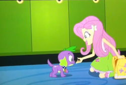 Size: 481x328 | Tagged: safe, screencap, fluttershy, spike, dog, equestria girls, equestria girls (movie), backpack, cropped, dog treat, duo, food, spike the dog