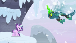 Size: 1280x720 | Tagged: safe, screencap, queen chrysalis, starlight glimmer, changeling, changeling queen, unicorn, the ending of the end, angry, badass, charging, duo, duo female, fangs, female, fight, flying, forked tongue, glowing horn, gritted teeth, hissing, horn, magic, mountain, open mouth, outdoors, snow, snowfall, tongue out, ultimate chrysalis, wind, windswept mane, wings