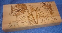 Size: 773x422 | Tagged: safe, artist:dawn-designs-art, artist:sapphire-burns-art, king sombra, queen chrysalis, changeling, changeling queen, pony, unicorn, crystal, female, photo, pyrography, traditional art, wood