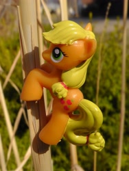 Size: 1944x2592 | Tagged: safe, applejack, blind bag, figure, irl, photo, plant, solo, toy