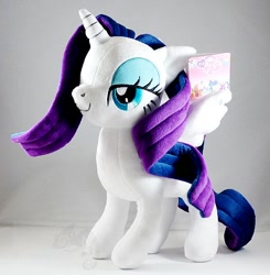 Size: 600x612 | Tagged: safe, artist:onlyfactory, rarity, alicorn, pony, bedroom eyes, bootleg, irl, photo, plushie, race swap, raricorn