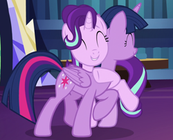 Size: 840x680 | Tagged: safe, screencap, starlight glimmer, twilight sparkle, twilight sparkle (alicorn), alicorn, pony, unicorn, uncommon bond, book, cropped, cute, duo, duo female, eyes closed, female, glimmerbetes, happy, hug, leaning, raised hoof, smiling, twiabetes, twilight's castle, twilight's castle library