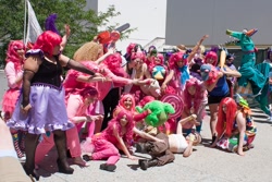 Size: 1080x720 | Tagged: artist needed, safe, crackle, pinkie pie, dragon, human, fanfic:cupcakes, .mov, cosplay, fanimecon, group photo, irl, irl human, photo, saloon pinkie