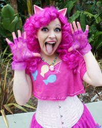 Size: 1628x2048 | Tagged: safe, artist:aktrez, pinkie pie, human, clothes, cosplay, fingerless gloves, gloves, irl, irl human, photo, silly face, solo, tongue out, wondercon