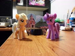 Size: 4608x3456 | Tagged: safe, applejack, twilight sparkle, earth pony, pony, female, mare, sweet apple acres, toy