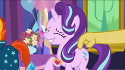 Size: 1136x640 | Tagged: safe, discord, starlight glimmer, sunburst, pony, unicorn, celestial advice, season 7, balloon, big smile, equestrian pink heart of courage, eyes closed, flower, happy, paws, tail, tapping