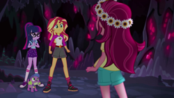 Size: 1280x720 | Tagged: safe, screencap, gloriosa daisy, sci-twi, spike, spike the regular dog, sunset shimmer, twilight sparkle, dog, equestria girls, legend of everfree, cave, clothes, converse, glasses, rear view, shoes, shorts, sneakers