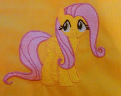 Size: 832x659 | Tagged: safe, artist:ethepony, fluttershy, pegasus, pony, embroidery, female, mare, pink mane, yellow coat