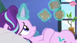 Size: 2208x1242 | Tagged: safe, screencap, starlight glimmer, pony, unicorn, every little thing she does, bed, blocks, cube, female, glowing horn, horn, levitation, magic, magic aura, mare, octahedron, on bed, potted plant, sad, solo, sphere, telekinesis