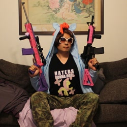 Size: 612x612 | Tagged: safe, fluttershy, human, brony, clothes, gun, hoodie, irl, irl human, photo, shirt