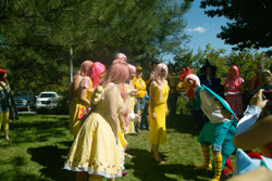 Size: 900x600 | Tagged: artist needed, safe, artist:cute-wolfie, fluttershy, cockatrice, human, animal, antagonist, clothes, convention, cosplay, costume, group photo, irl, irl human, ndk, photo