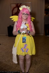 Size: 1365x2048 | Tagged: artist needed, safe, fluttershy, human, cosplay, floral head wreath, glasses, irl, irl human, momocon, photo, plushie, solo