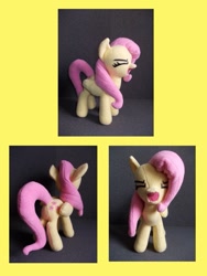 Size: 657x876 | Tagged: safe, artist:mantaro85, fluttershy, pegasus, pony, eyes closed, female, flutteryay, irl, mare, photo, plushie, yay