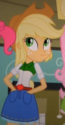 Size: 418x796 | Tagged: safe, screencap, applejack, equestria girls, equestria girls (movie), cropped, liar face, scrunchy face, solo focus