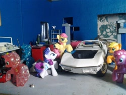 Size: 2048x1536 | Tagged: safe, applejack, fluttershy, linky, pinkie pie, rarity, red gala, shoeshine, apple family member, blind bag, car, chevrolet, chevrolet corvette, corvette, corvette c3, crimson gala, everfree customs, garage, irl, photo, toy