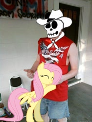 Size: 540x720 | Tagged: safe, fluttershy, chair, irl, photo, ponies in real life, porch, redneck, the man they call ghost, thumbs up, true capitalist radio, united states