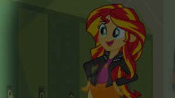 Size: 300x168 | Tagged: safe, edit, edited screencap, screencap, sunset shimmer, comic:a new change, equestria girls, equestria girls (movie), clothes, hand on hip, jacket, leather jacket, lockers, pregnant, pregnant edit, skirt, solo