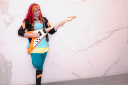 Size: 5330x3553 | Tagged: safe, artist:maddymoiselle, sunset shimmer, human, equestria girls, rainbow rocks, absurd resolution, boots, clothes, cosplay, costume, flying v, guitar, irl, irl human, photo, photography, smiling, solo, sunset shredder